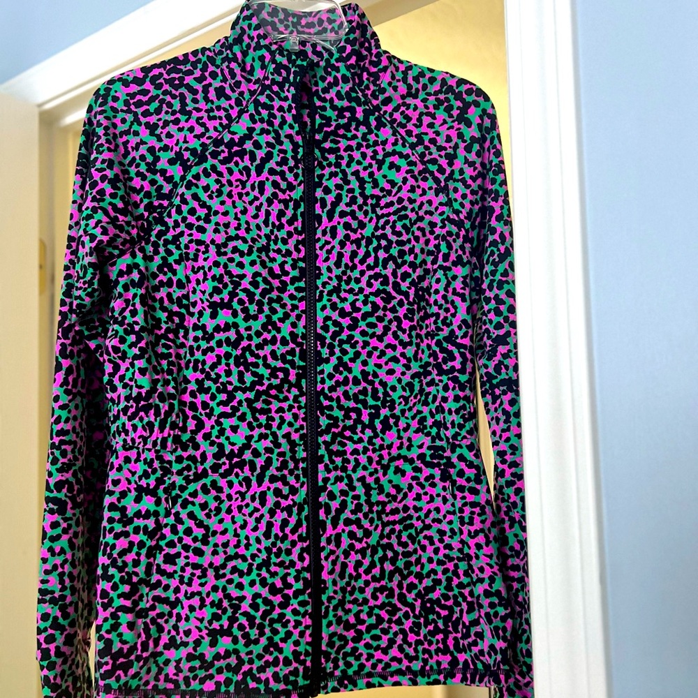 Fabletics Multi color Zip down active wear jacket with thumb holes.